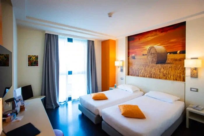 Standard singoli camera an hotel melegnano arancione 1 an hotels - milano business hotels di design a milano - an hotels